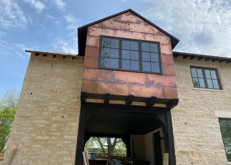 Copper metal panel facade on a stone building for Metal Roof Coating in Park Ridge